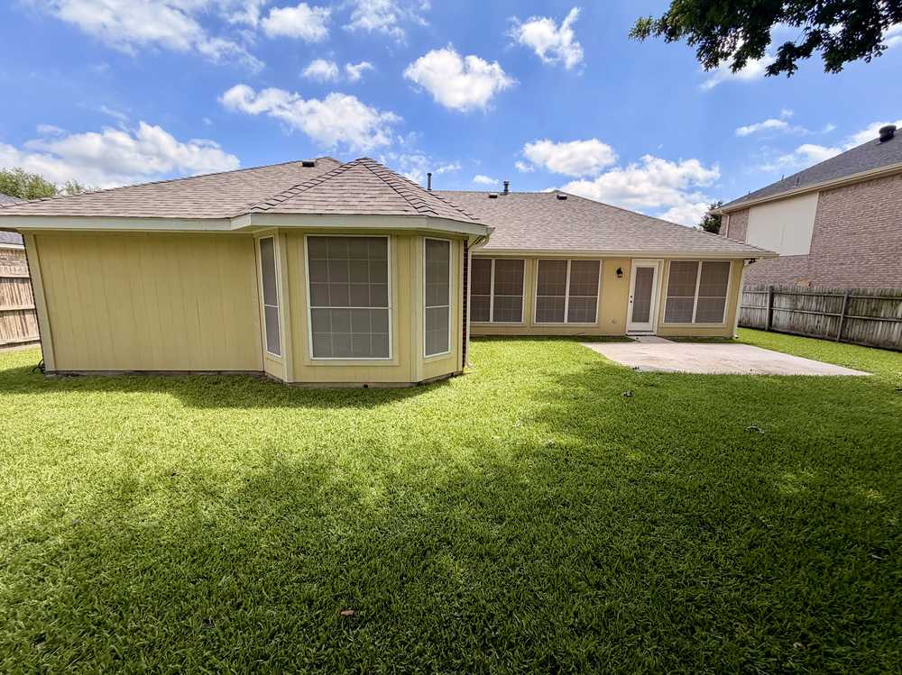 Siding replacement and backyard turnaround - after