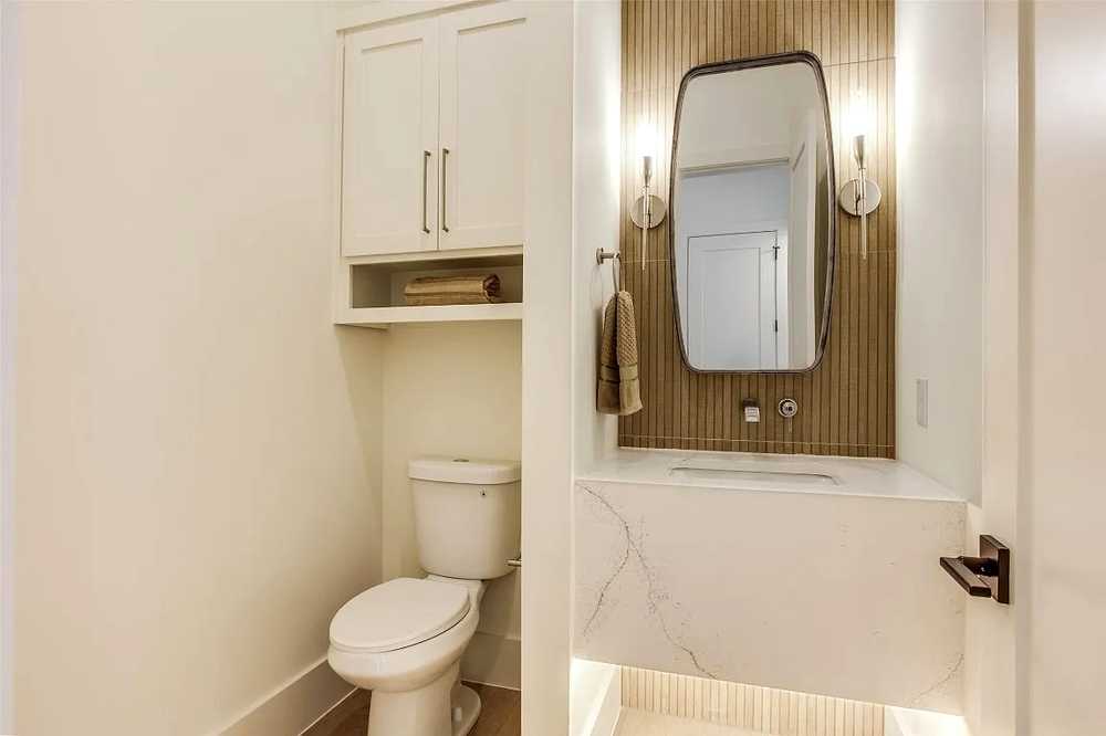 Guest bath - floating shelf and wood slat wall