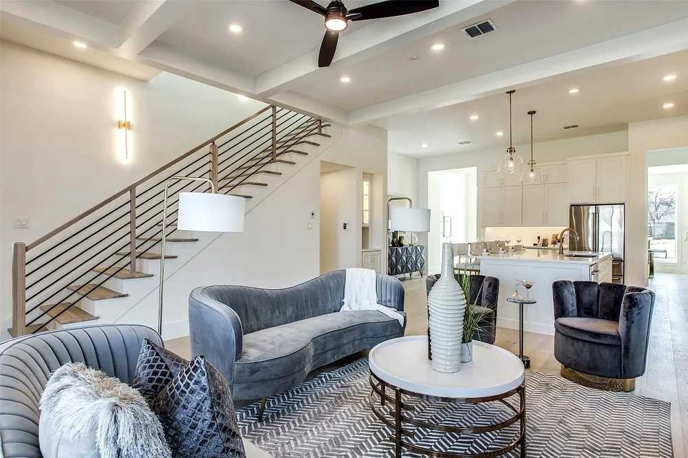 Open-concept living and stair - completed build