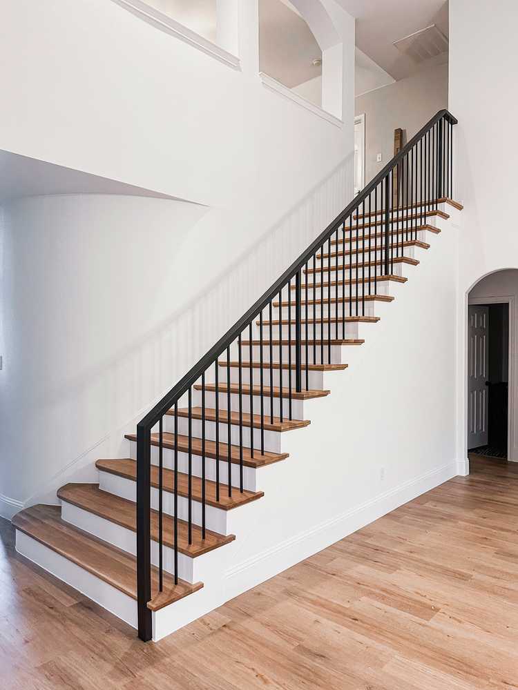 Iron-rail staircase, white oak treads
